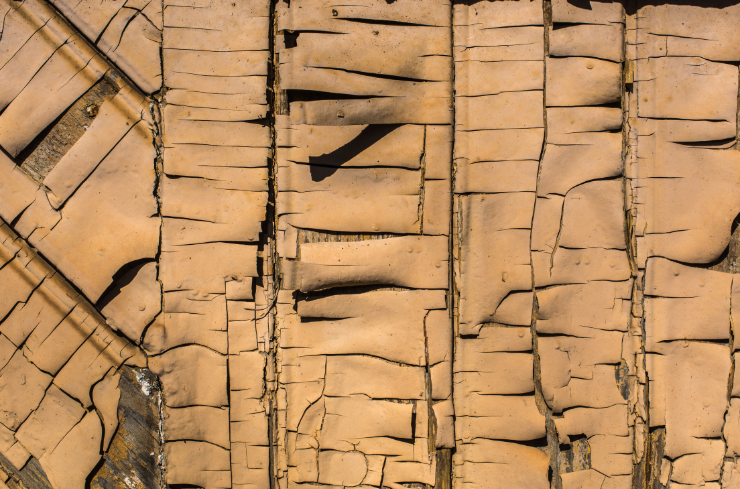 Cracked or flaky wood Why Summer Is the Perfect Time to Replace Rotted Wood Around Your Home